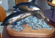 "Ultimate Swimmers" bronze sculpture by Ann LaRose