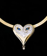 "Sapphire Eyes & Diamonds Mask" 18K Gold with diamonds and Sapphires Pendant by Erte